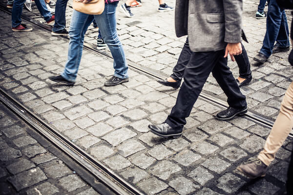 Crowd of people crossing the street